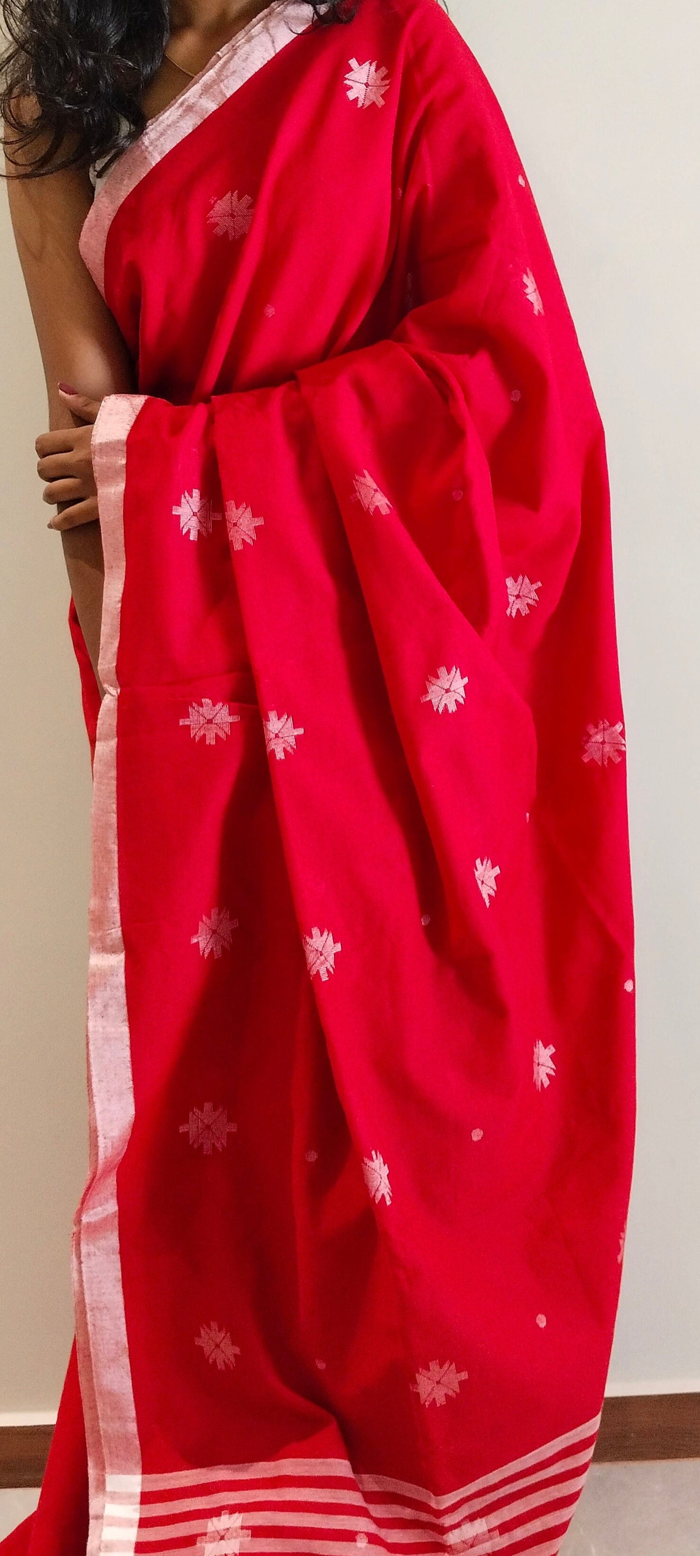 RED- KHADI COTTON SAREE WITH THREAD WOVEN FLORAL BUTTAS AND SIMPLE BORDER
