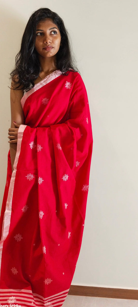 RED- KHADI COTTON SAREE WITH THREAD WOVEN FLORAL BUTTAS AND SIMPLE BORDER