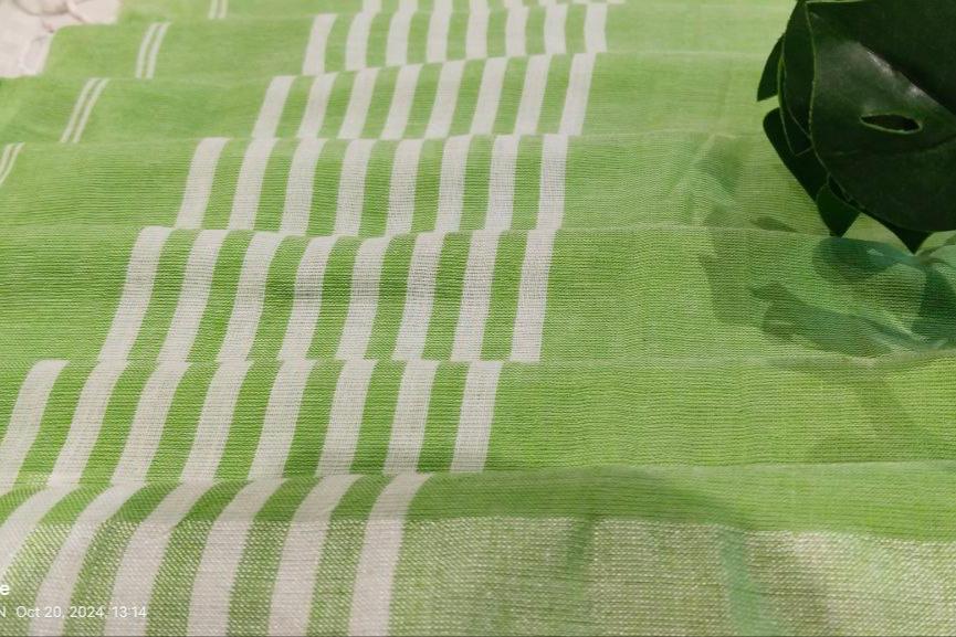 LIGHT GREEN- KHADI COTTON SAREE WITH THREAD WOVEN FLORAL BUTTAS AND SIMPLE BORDER