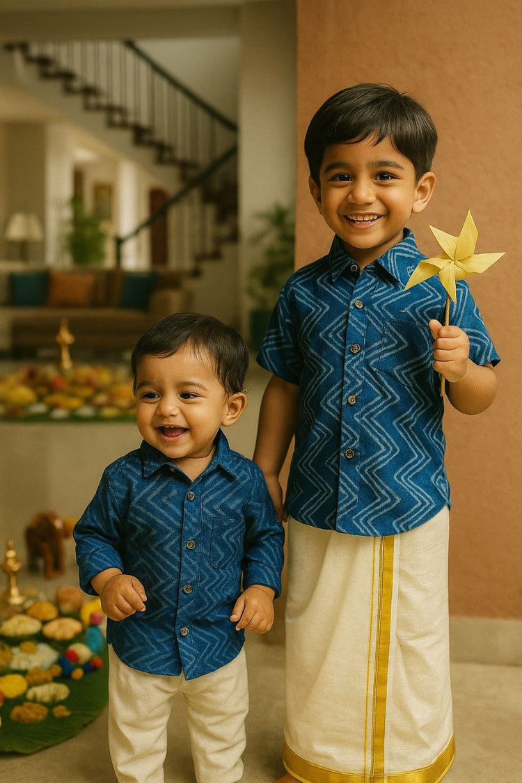 toddlers wearing indigo shirt and kerala kasavumund 