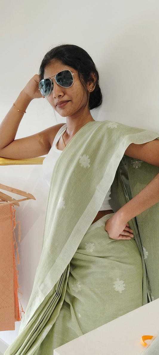 OLIVE GREEN- KHADI COTTON SAREE WITH THREAD WOVEN FLORAL BUTTAS AND SIMPLE BORDER