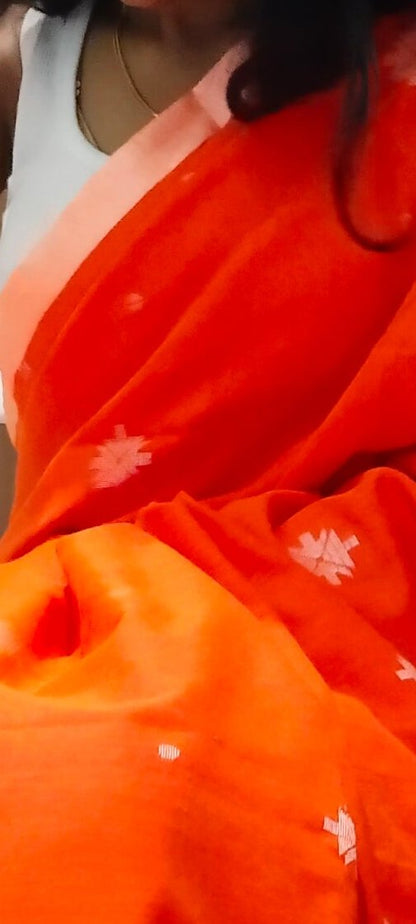 BRIGHT ORANGE-KHADI COTTON SAREE WITH THREAD WOVEN FLORAL BUTTAS AND SIMPLE BORDER