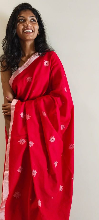 RED- KHADI COTTON SAREE WITH THREAD WOVEN FLORAL BUTTAS AND SIMPLE BORDER
