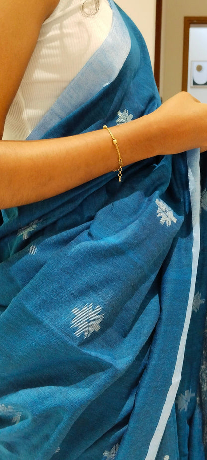 DEEP BLUE-KHADI COTTON SAREE WITH THREAD WOVEN FLORAL BUTTAS AND SIMPLE BORDER