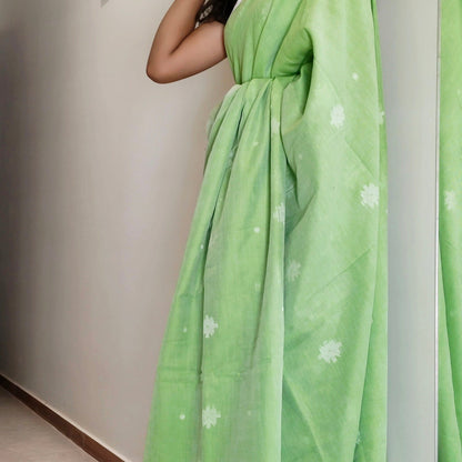 LIGHT GREEN- KHADI COTTON SAREE WITH THREAD WOVEN FLORAL BUTTAS AND SIMPLE BORDER