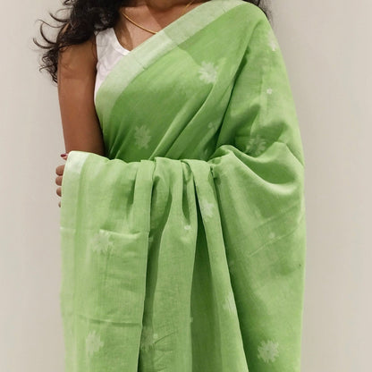 LIGHT GREEN- KHADI COTTON SAREE WITH THREAD WOVEN FLORAL BUTTAS AND SIMPLE BORDER