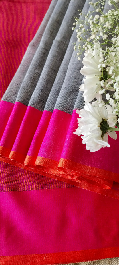 GREY PLAIN LINEN SAREE WITH ORANGE AND PINK BORDER AND CONTRAST PALLU
