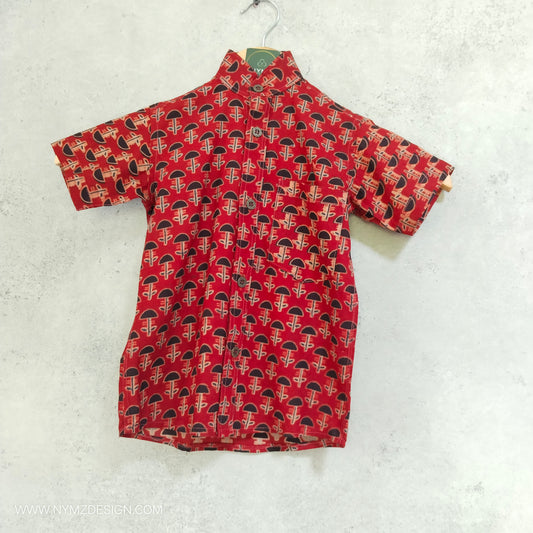 "Ajrakh brick red pure cotton kids shirt with Chinese collar and star hand embroidery near pocket – handblock printed cotton ethnic wear"
